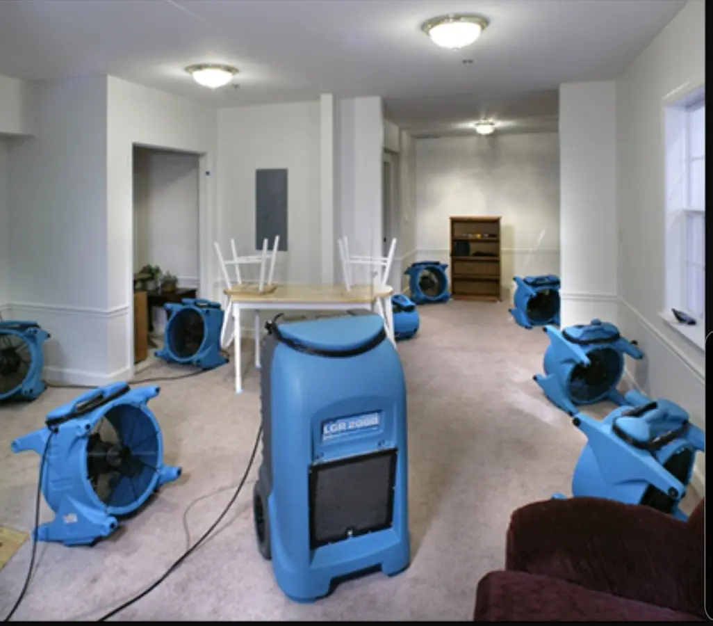 Air movers and dehumidifier setup for Water Damage Restoration in Dock Junction